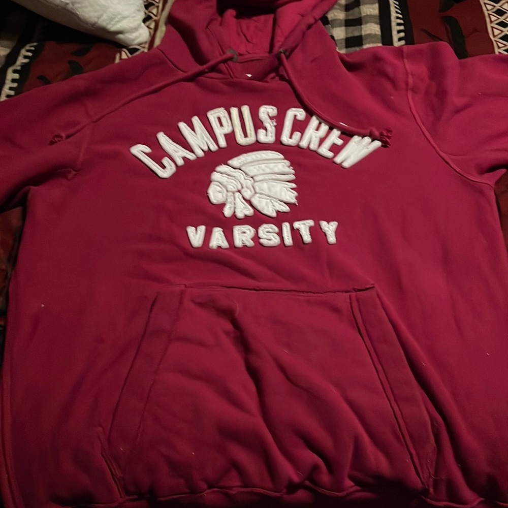 Maroon sweater from campuscrew never worn it’s a size large
